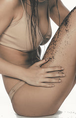 Girls washing off coffee scrub