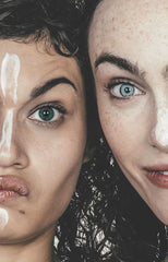 Girls with everyday face moisturiser on their noses.