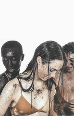 Girl biting into body balm tube